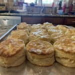 Tray of golden, fluffy homemade biscuits, perfect for a Georgetown KY breakfast.