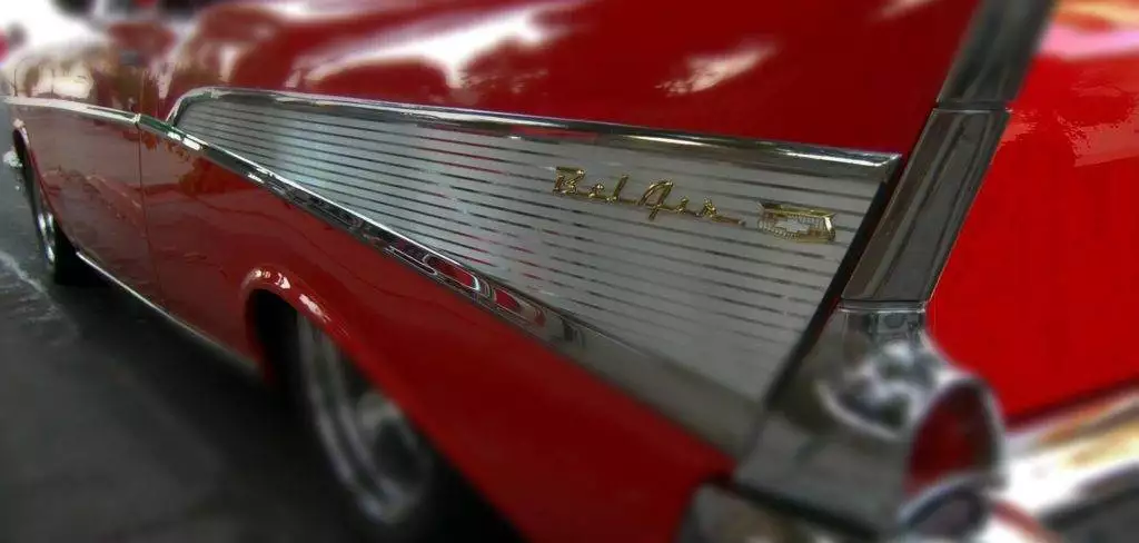 Classic red 1957 Chevy Bel Air tail fin detail. Georgetown KY vintage car show.