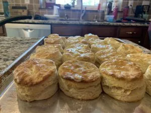 Tray of golden, fluffy homemade biscuits, perfect for a Georgetown KY breakfast.